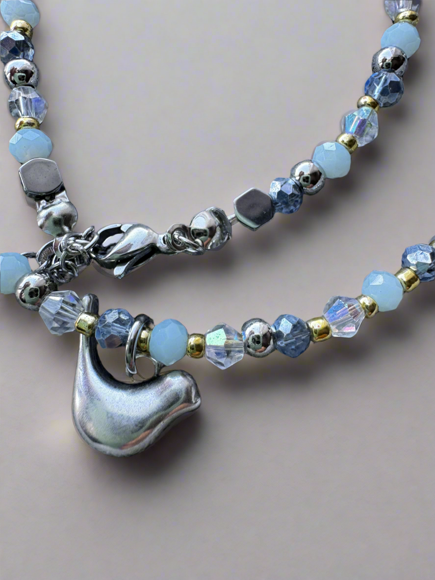 #silver birdie necklace